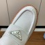Prada Women's Loafers in White Grained Leather 